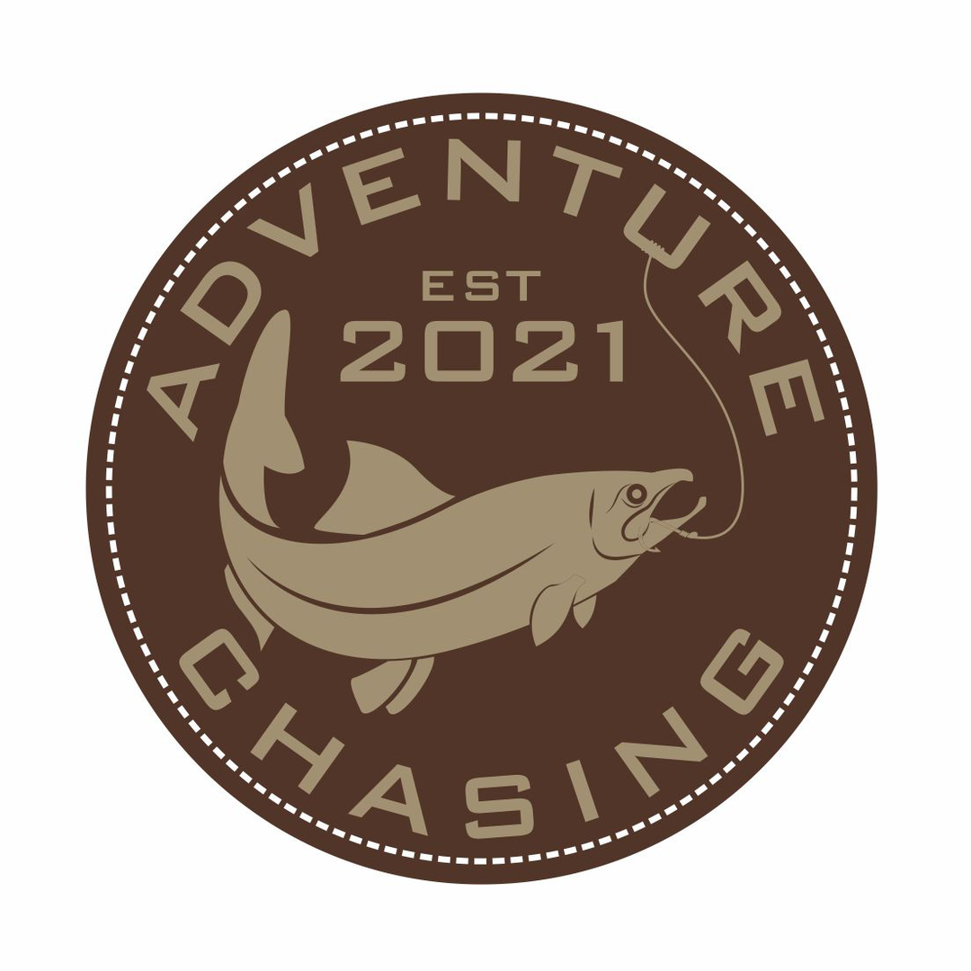 Brown circular logo with a fish illustration and the text 'Adventure Chasing, established 2021' surrounding it.