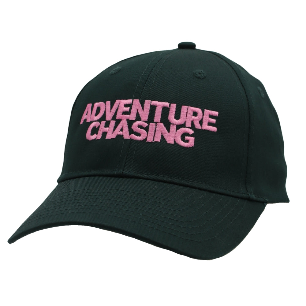 A dark forest green baseball cap with 'ADVENTURE CHASING' embroidered in pink across the front, shown on a plain white background.
