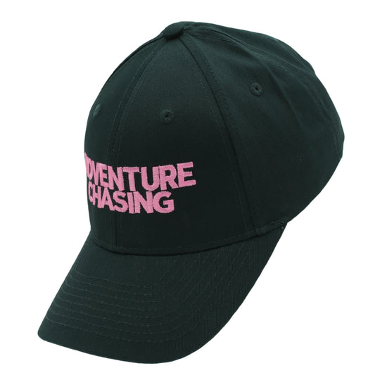 A dark forest green baseball cap with the words 'ADVENTURE CHASING' embroidered in pink on the front, shown against a plain white background.