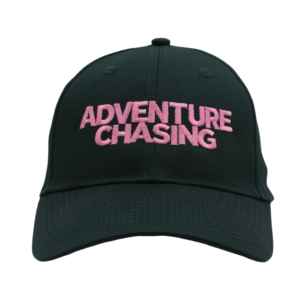 A dark green cap with 'ADVENTURE CHASING' embroidered in pink across the front, shown from the front.