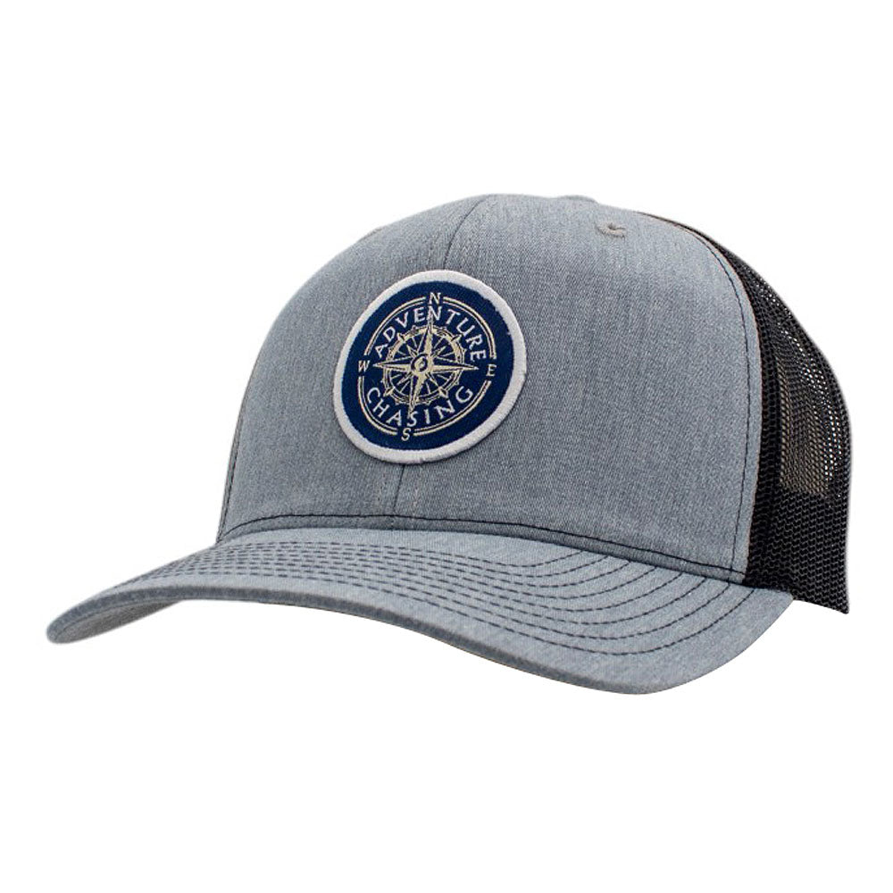 Gray adjustable cap with a round logo that reads 'Adventure Awaits'.